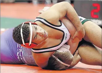  ?? [BARBARA J. PERENIC/DISPATCH] ?? Dom Demas of Dublin Coffman had a 51-3 record and won a state title at 145 pounds. His verdict: “The season was great, but it should have been better.”