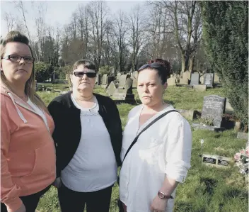  ??  ?? Eileen Dennis and family by Claire’s grave at Sowerby Bridge Cemetery