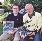  ??  ?? Matthew Squire [left] and Arnold Palmer with the first issue of Kingdom