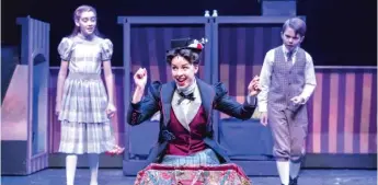  ?? | BRETT A. BEINER ?? Nicole Armold ( center) plays Mary Poppins, with Sage Harper ( left) and Casey Lyons as Jane and Michael Banks in the Mercury Theater Chicago production of “Mary Poppins.”