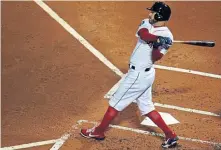  ?? MATT STONE / BOSTON HERALD ?? A BIG HIT: Ian Kinsler connects for an RBI single in the second inning of last night’s Game 2 at Fenway.