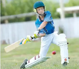  ??  ?? Western Park’s Tom Gardiner plays a cover drive during the under 14 match against Yarragon.