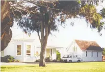  ?? Photos / Auckland Libraries Heritage Collection; Mike Scott ?? The former St Mary’s Women’s Home in O¯ ta¯huhu.
Maggie Wilkinson (below right) with Anglican Trust for Women and Children chief executive Judy Matai’a and Anglican Bishop of Auckland Ross Bay.