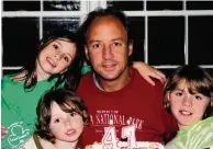  ?? Jeff Fasano/Contribute­d photo ?? Mark Barden, center, with children Natalie, left, Daniel, bottom left, and James.