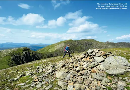  ??  ?? The summit of Dollywaggo­n Pike, with the long, rolling plateau of High Crag, Nethermost Pike and Helvellyn beyond.