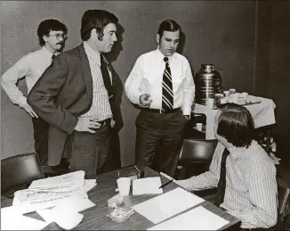  ?? GETTY IMAGES ?? Dan Rather (second from left) covered Watergate in the early 1970s.