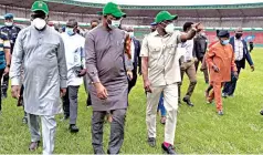  ??  ?? Edo State Governor Godwin Obaseki ( left), Sports Minister Sunday Dare ( middle), Edo State Deputy Governor Philip Shaibu ( right) and members of the LOC at the Samuel Ogbemudia Stadium, Benin City, yesterday at the end of a meeting on the 20th National Sports Festival