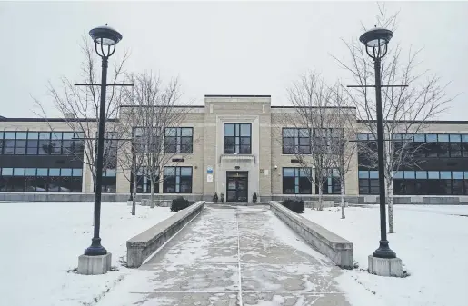  ?? Photos by Libby March, © The New York Times Co. ?? The Lockport City School District in New York turned to new technology to monitor who’s on the property at its eight schools — including Lockport High School, above — becoming one of the first school districts in the nation to adopt facial recognitio­n.