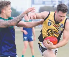  ??  ?? CLASH: Colac's Joffy Simpkin and St Mary's Jake Welsh.