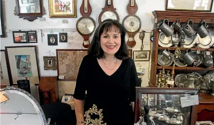  ??  ?? Jutta Mark, owner of Aly’s Antiques in Cambridge.