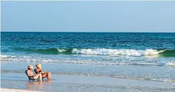  ?? DREAMSTIME ?? Spring vacation calls for a few good books to read while relaxing at the beach.