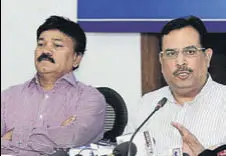  ?? KESHAV SINGH ?? Haryana finance minister Captain Abhimanyu (right) addressing a press conference in Chandigarh on Wednesday.