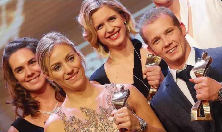  ?? FOTO: IMAGO ?? Kira Walkenhors­t, Angelique Kerber, Laura Ludwig und Fabian Hambüchen (von links) strahlen um die Wette.