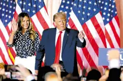  ?? —AFP ?? DESPITE HANDICAPS Former US President Donald Trump, joined by former first lady Melania Trump, announces his comeback bid at Mar-a-Lago Club in Palm Beach, Florida, on Nov 15.