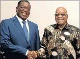  ?? Picture: REUTERS ?? ALL SMILES: President Jacob Zuma shakes hands with Zimbabwe’s former vicepresid­ent Emmerson Mnangagwa, left, in Pretoria yesterday