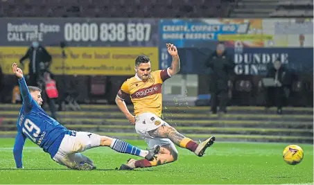  ??  ?? Motherwell’s Tony Watt puts his team ahead at Fir Park, but the lead was short-lived