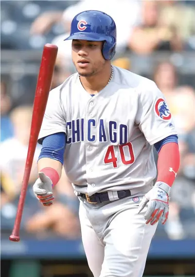  ?? JUSTIN BERL/GETTY IMAGES ?? Cubs catcher Willson Contreras flips his bat after striking out in the ninth inning Sunday at PNC Park.