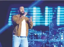  ?? NBC ?? Julian Awari, of Virginia Beach, made his debut during Monday night’s episode of “The Voice,” taking viewers back to 1992 with the R&B classic “Weak” by SWV.