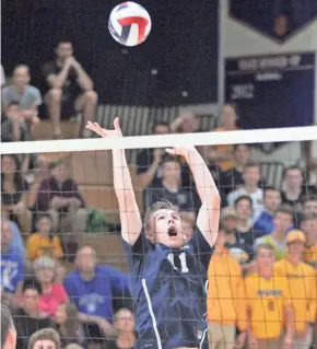  ?? CURT HOGG / MILWAUKEE JOURNAL SENTINEL ?? Marquette setter Charlie Brockman is averaging nine assists per set heading into WIAA state tournament play.