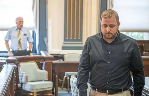  ?? Alexandra Wimley/ Post- Gazette photos ?? Jeriah Mast stands to leave after a pre- trial hearing at the Holmes County courthouse on Thursday in Millersbur­g, Ohio.