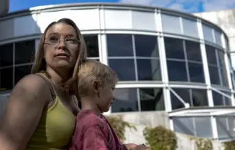  ??  ?? Brittany Lee, 34, takes coffee to the staff at Arapahoe Community College once a week to thank them for their child care for her son Oliver. She said she wouldn’t have been able to graduate without ACC’S child care center and grants.