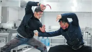  ?? SONY PICTURES/ AP PHOTO ?? Iko Uwais, left, and Cecep Arif Rahman star in The Raid 2, which is not for the squeamish.