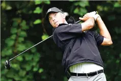  ?? — AFP photo ?? Matt Kuchar of the United States plays his shot from the 16th tee during round one of the RBC Canadian Open at Glen Abbey Golf Club on July 27, 2017 in Oakville, Canada.