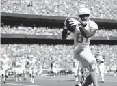  ?? DAVID EULITT/GETTY ?? Chargers wide receiver Mike Williams scores the winning TD with 32 seconds remaining Sunday.