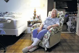  ?? Paul Chinn / The Chronicle ?? Linda Rosario, shown in her S.F. home, is struggling to find a new residence for her mother, Penny Fong, 103, who is one of 18 residents remaining at the Irene Swindells Alzheimer’s Residentia­l Care Program operated at California Pacific Medical Center.