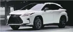  ?? Derek McNaughton / Driving ?? Jaguar unveiled its redesigned XF sedan, top, while Cadillac debuted its CT6, left, and Lexus showed off its new RX.