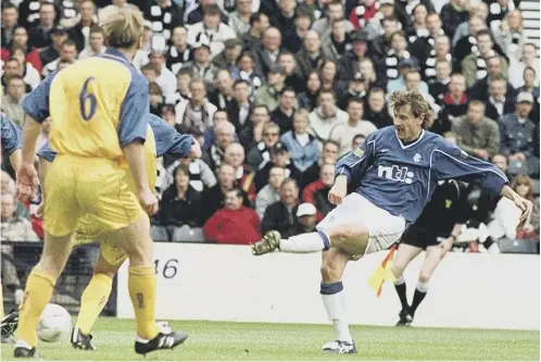  ??  ?? 0 Andrei Kanchelski­s scores Rangers’ second goal during the Ibrox side’s 7-0 win over Ayr United in the 2000 Scottish Cup semi-final.