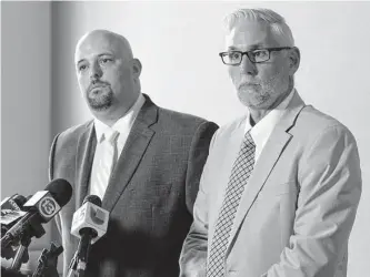  ?? Yi-chin Lee/staff file photo ?? Nicholas Poehl, left, and Robert Barfield, lawyers for the Santa Fe shooting suspect, have accused Judge Jeth Jones of a “public show.” Jones took over as the 122nd District Court judge on Jan. 1.