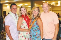  ?? NWA Democrat-Gazette/CARIN SCHOPPMEYE­R ?? Dan and Rebecca Ross (from left) and Amy and David Bates attend the Beach Bingo Bash.