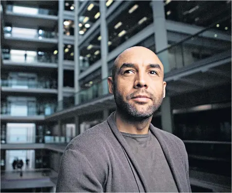  ??  ?? No words: Alex Beresford in the week after his cousin Nathaniel Armstrong (left) was stabbed to death, and presenting the weather forecast on Good Morning Britain (above)