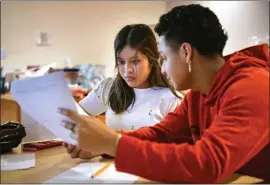  ?? ?? High school students collaborat­e on a math problem for finals week. Emery Unified School District is one of the bright spots from the recent statewide Smarter Balanced K-12test results. Its Black students made dramatic gains from 2022.