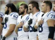  ?? STEPHEN BRASHEAR — THE ASSOCIATED PRESS ?? Indianapol­is Colts players, including quarterbac­k Andrew Luck, second from left, stand during the singing of the national anthem before an NFL football preseason game against the Seattle Seahawks, Thursday in Seattle.