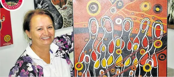  ?? PHOTO: ANTHEA GLEESON ?? ARTISTIC OUTLET: Artist Cheryl Moggs is one of about 20 members of the new Songline Creatives arts collective. The collective features indigenous and non-indigenous artists who exhibit in a previously vacant shop front in the Wilsonton Shopping Centre.