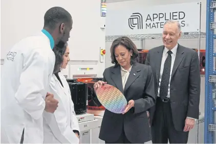  ?? NYT ?? Vice President Kamala Harris holds a silicon wafer during a tour of Applied Materials in Sunnyvale, California, on Monday.