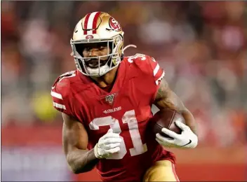  ?? AP Photo/Tony Avelar ?? In this Jan. 19 file photo, San Francisco 49ers running back Raheem Mostert (31) runs against the Green Bay Packers during the second half of the NFL NFC Championsh­ip football game in Santa Clara, Calif.