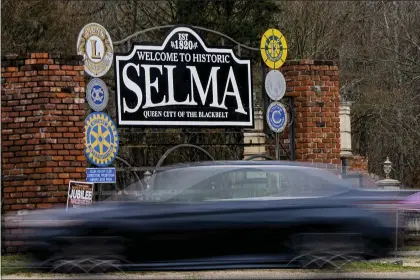  ?? MIKE STEWART — THE ASSOCIATED PRESS ?? A vehicle passes by the town welcome sign, Thursday, Feb. 29, 2024, in Selma, Ala. Events commemorat­ing the 59th anniversar­y of the Bloody Sunday voting rights march in 1965will culminate with a bridge crossing in Selma, Ala, on Sunday, March 3.