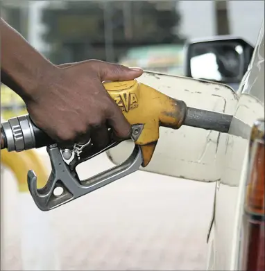  ?? PICTURE: DUMISANI SIBEKO ?? WARNING: Petrol attendants putting the wrong type of fuel in vehicles can have dire consequenc­e for the owners.