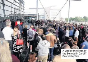  ??  ?? A vigil at the steps of the Senedd in Cardiff Bay yesterday