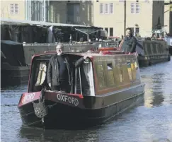  ??  ?? HOPE: Director of Sowerby Bridge-based Shire Cruisers Nigel Stevens in the foreground