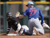  ?? ROSS D. FRANKLIN — THE ASSOCIATED PRESS ?? Chicago Cubs second baseman Matt Shaw tags out the Giants' Luis Matos attempting to steal second base.