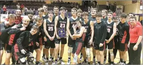  ??  ?? Hawks take down Lavaca 43-39 and win the Golden Arrow Classic! “This was a huge win for our guys against a really talented, well coached Lavaca team,” coach Trent Loyd said. “They played their hearts out and left it all out on the floor!”