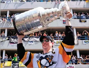  ?? The Canadian Press ?? Pittsburgh Penguins’ Sidney Crosby will hoist the Stanley Cup again on Monday when he will mark his 30th birthday by once again parading it around his hometown in Nova Scotia.
