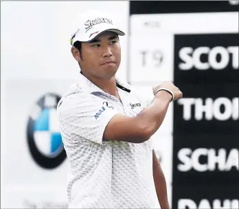  ?? JOE LEWNARD/AP ?? Hideki Matsuyama celebrates after sinking a 30-foot birdie putt to close out his second round at the BMW Championsh­ip. He broke the Medinah course record with a 63.