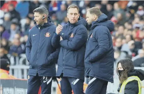  ?? ?? Sunderland’s Head of Individual Player Developmen­t Mike Dodds, with Michael Proctor and Phil Jevons.