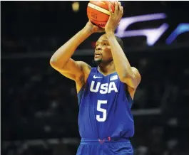  ?? (Reuters) ?? AFTER SCORING a team-high 19 points in Team USA’s 106-57 blowout exhibition victory over China on Sunday night in Los Angeles, Kevin Durant will play in front of his new home fans for the first time since moving from Oklahoma City to the Golden State...