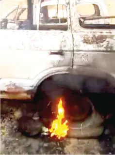  ??  ?? A burning vehicle is seen in a village after an attack with vehicles in Ogossagou, Mali. — Reuters photo